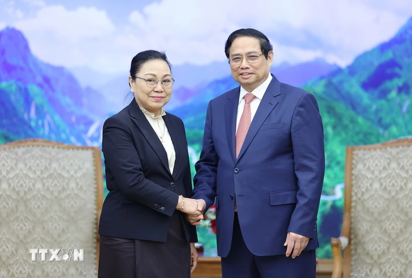 Thủ tướng Phạm Minh Chính tiếp bà Khamphao Eunthavanh, Đại sứ Lào tại Việt Nam. (Ảnh: Dương Giang/TTXVN)

