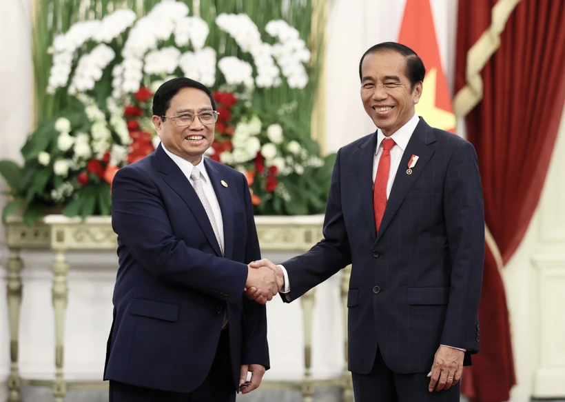 Thủ tướng Phạm Minh Chính hội kiến Tổng thống Indonesia Joko Widodo. (Ảnh: Dương Giang/TTXVN)