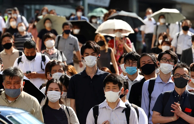 Người dân đeo khẩu trang ở Tokyo. (Nguồn: Kyodo)