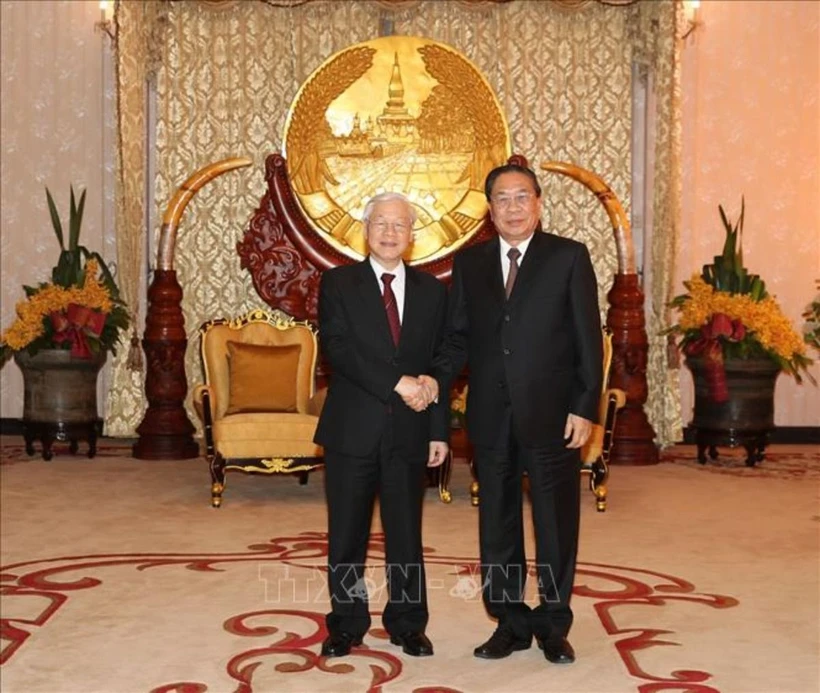 Tổng Bí thư-Chủ tịch nước Nguyễn Phú Trọng gặp đồng chí Choummaly Sayasone, nguyên Tổng Bí thư-Chủ tịch nước Lào, tại Thủ đô Vientiane, trong chuyến thăm hữu nghị chính thức nước Cộng hòa Dân chủ Nhân dân Lào ngày 24/2/2019. (Ảnh: Trí Dũng/TTXVN)