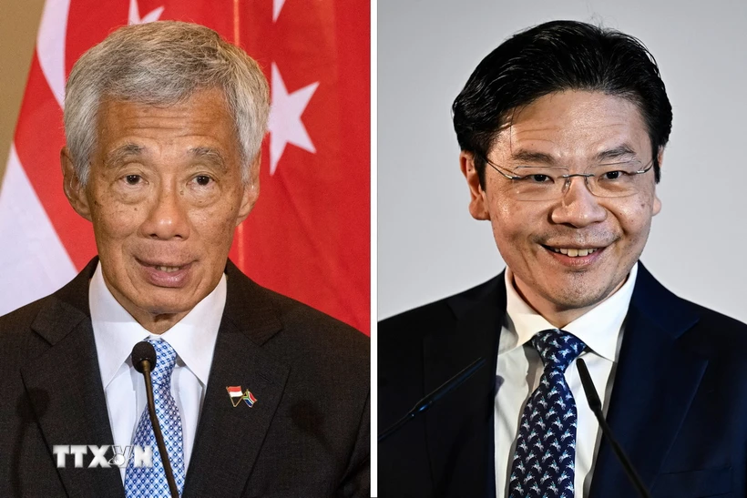 Thủ tướng Singapore Lý Hiển Long (trái) và Phó Thủ tướng Lawrence Wong. Ảnh: AFP/TTXVN