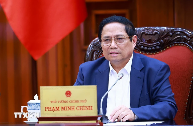 Thủ tướng Phạm Minh Chính chủ trì cuộc họp về chính sách tài khóa. (Ảnh: Dương Giang/TTXVN)