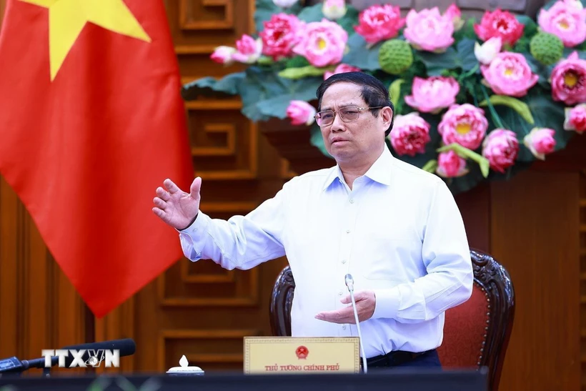 Thủ tướng Phạm Minh Chính chủ trì họp về tình hình thi công Dự án đường dây 500kV mạch 3. (Ảnh: Dương Giang/TTXVN)