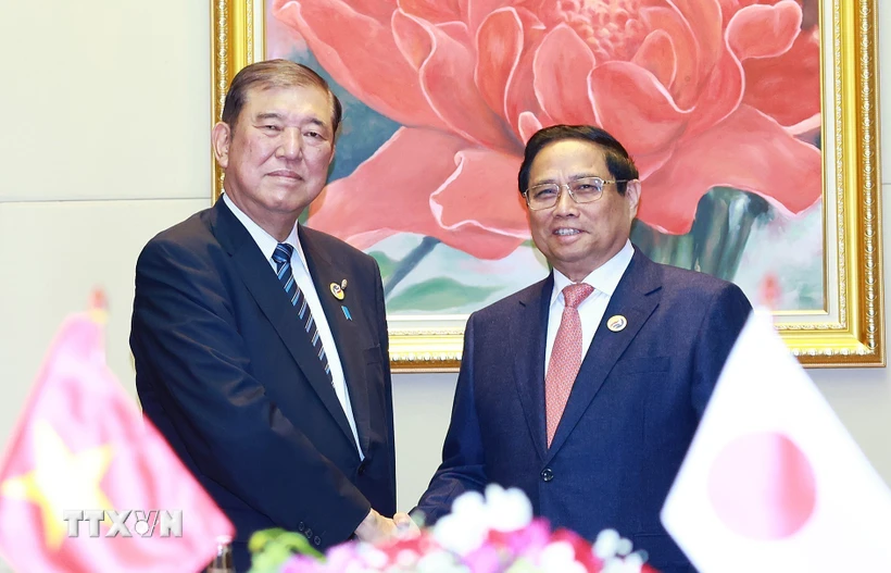 【写真①】日本の石破茂首相と会合を行うファン・ミン・チン首相（ベトナム通信社）