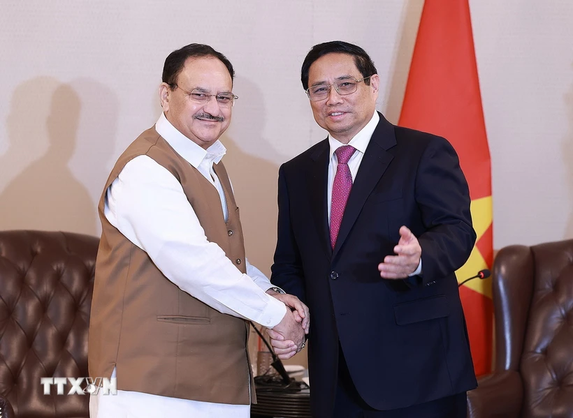 Thủ tướng Phạm Minh Chính tiếp Chủ tịch Đảng Nhân dân Ấn Độ (BJP) Jagat Prakash Nadda. (Ảnh: Dương Giang/TTXVN)