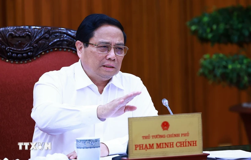 Thủ tướng Phạm Minh Chính chủ trì buổi làm việc. (Ảnh: Dương Giang/TTXVN)